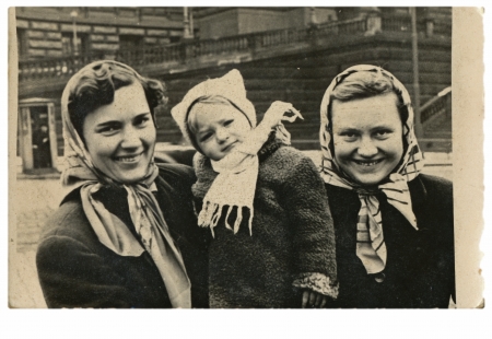 CIRCA 1955 - young mother with a child 