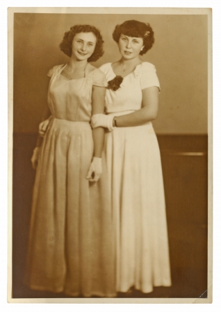 PRAGUE, CZECHOSLOVAKIA, CIRCA 1944 - graduation, two girls - circa 1944の写真素材