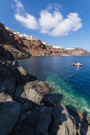 Santorini is characterized by its Cycladic architecture - white painted villages that stand on the top of the high cliffs.の写真素材