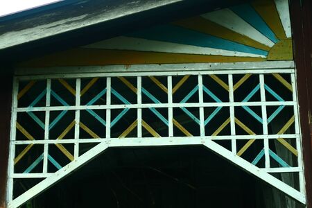 Wooden frame divider of the traditional Malay houseの写真素材