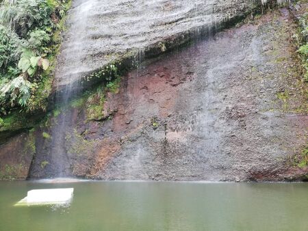 Waterfall and the pool by the roadsideの写真素材