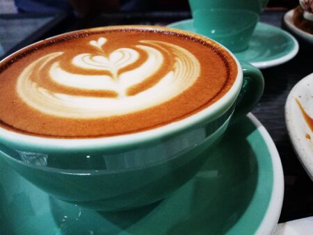 Art-deco coffee latte at the cafeの写真素材
