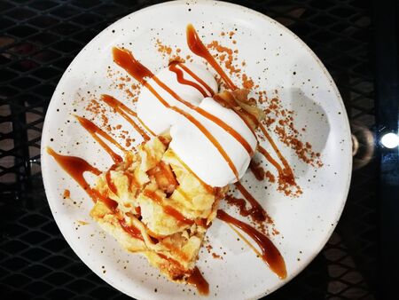Peanut butter pie with two scoops of ice creamの写真素材