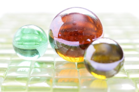 The glass ball is used in the toy and the interior.の写真素材