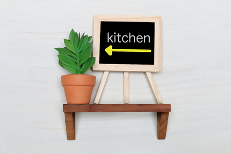 Wall shelf and Fake Green terracotta pot and blackboardの写真素材