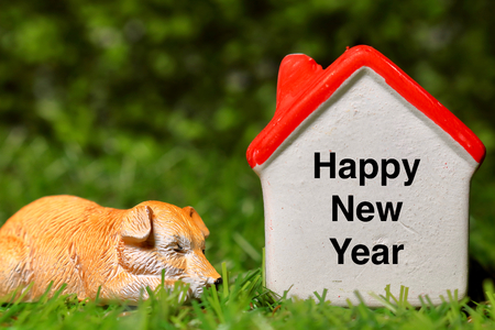 Happy New Year and Dog and Houseの写真素材