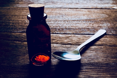 Bottle and spoonの写真素材