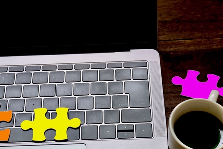 Laptops and puzzlesの写真素材