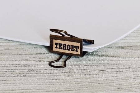 Documents and antique style double clip with  TERGET word