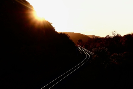 Railway shining in the evening sunの写真素材