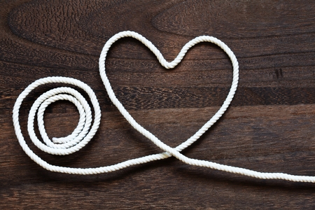 Heart-shaped made with ropeの写真素材