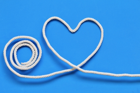 Heart-shaped made with ropeの写真素材