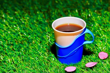 Coffee and lawn and cherry confettiの写真素材