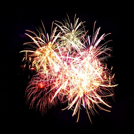 Firework streaks in night sky, celebration backgroundの写真素材