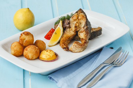 Grilled fish with fried cheese