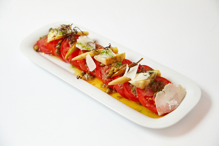 Fresh Caprese salad isolated on whiteの写真素材