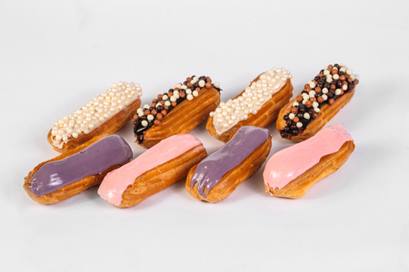 Group of french dessert Eclair on white backgroundの写真素材