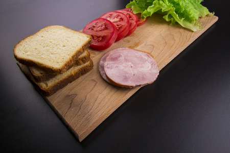 sandwich with tomato cheese and ham