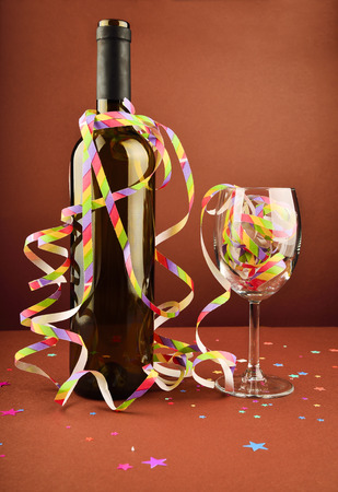 A bottle of wine in festive decorationの写真素材