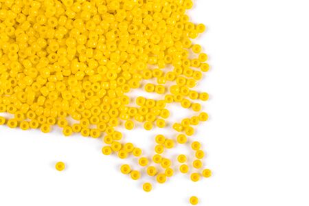 Scattering of colored beads on a white backgroundの写真素材