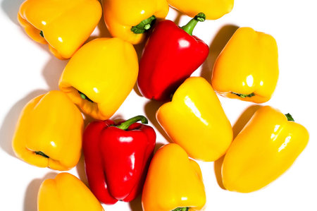 colorful bell peppers, natural background, yellow and red peppers