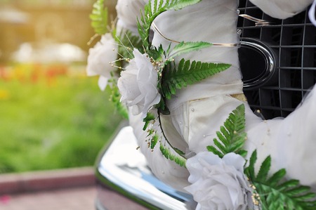 Wedding flowers decoration closeup on the carの写真素材
