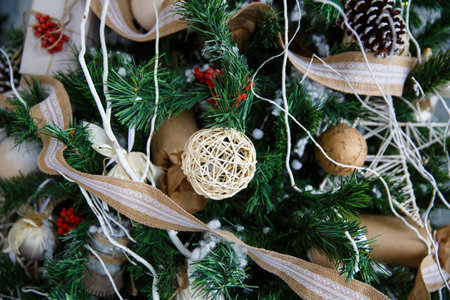 Christmas tree with toys and decorations in interior design in the roomの写真素材