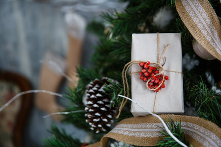 Christmas tree with toys and decorations in interior design in the roomの写真素材