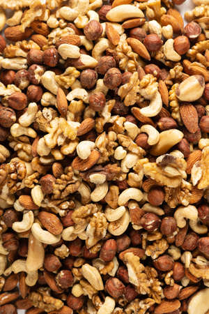 A set of dried fruits for proper healthy nutrition close-up top view backgroundの写真素材