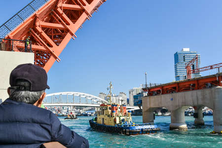 Busan city, South Korea-OCT 31, 2019: Tourists near drawbridge- Yeongdodaegyo Bridge in Jung-gu,...