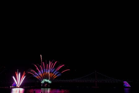 Colorful fireworks and Gwangan Bridge in Busan City, South Korea.の写真素材
