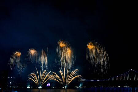 Colorful fireworks and Gwangan Bridge in Busan City, South Korea.
