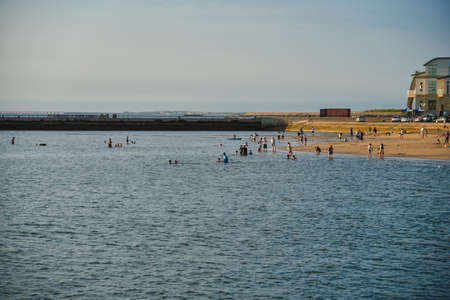 people playing by the seaの写真素材