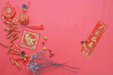 Chinese New Year decoration on red background, closeup of photo.の写真素材