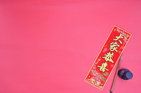 Chinese New Year decoration on red background, closeup of photo.の写真素材