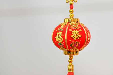 Chinese New Year decoration on red background, closeup of photo.の写真素材