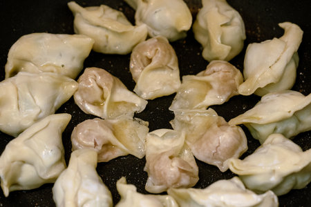 Fried dumplings on the potの写真素材