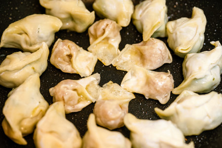 Fried dumplings on the potの写真素材