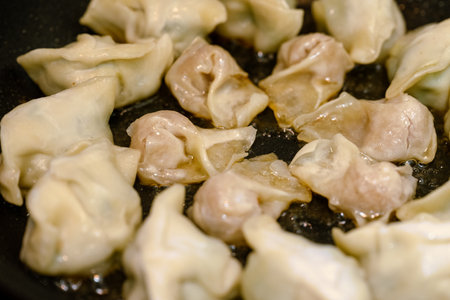 Fried dumplings on the potの写真素材