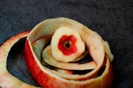 There is no skin on the apple pulp, and the remaining apple skin is a hollow apple.with black...