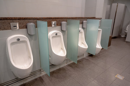 SINGAPORE - OCTOBER 24, 2024: Men's toilet inside airport, Singaporeの写真素材
