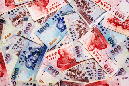 A Large Spread of New Taiwan Dollar Banknotes, Representing Wealth and Financial Concept, Background of New Taiwan Dollarの写真素材