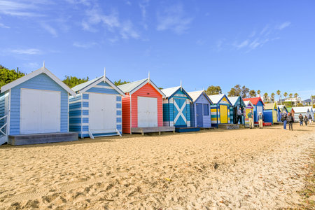 MELBOURNE, VICTORIA, AUSTRALIA - JUNE 1, 2023: People walking on Brighton Beach, Melbourne, Australiaの写真素材