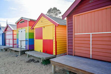 MELBOURNE, VICTORIA, AUSTRALIA - JUNE 1, 2023: People walking on Brighton Beach, Melbourne,...