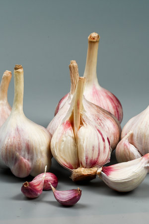 Fresh Garlic Bulb with Peeling Skins. purple garlic. Suitable for cooking, health, food...