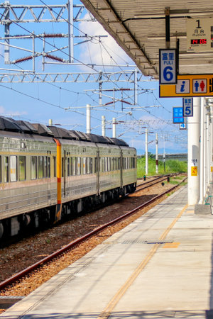Taiwan May 21, 2024: A scenic view of a train at Fuli Station in Hualien, Taiwan, with clear sky and mountain background. Ideal for travel, transport, and rural tourism themes. Fuli Station and Train in Taiwanの写真素材