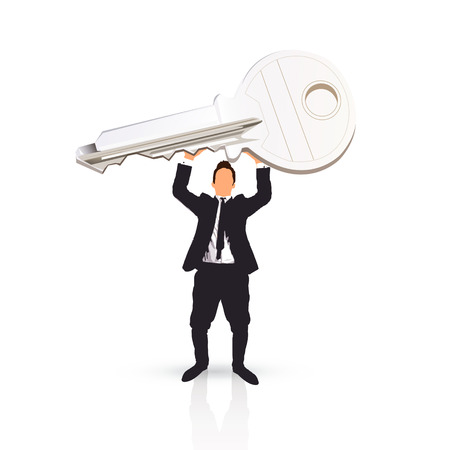 young businessman holding a keyの写真素材