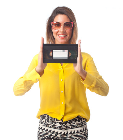 young cool woman with a cassette