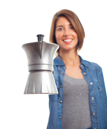 young cool woman with a kettleの写真素材