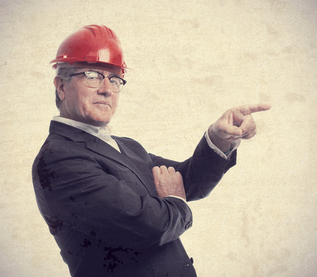 senior cool man architect pointing